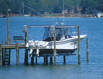 Fishing Boat on lift at end of pier, ready to go fishing in the Chesapeake Bay Photo 